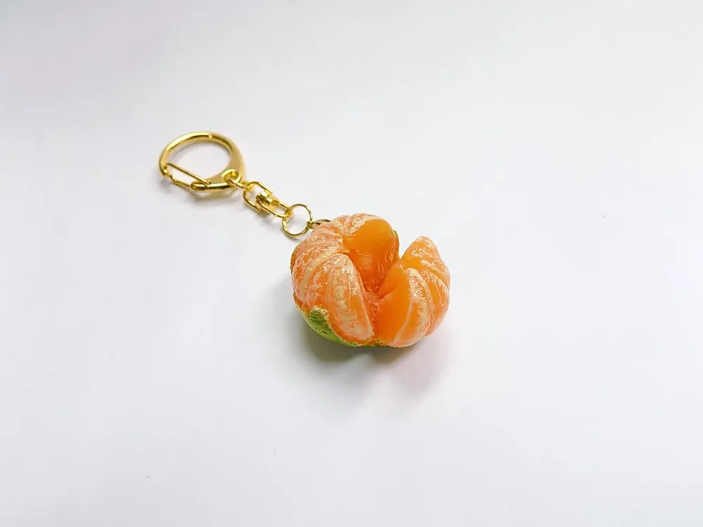 Small mandarin with green skin keychain