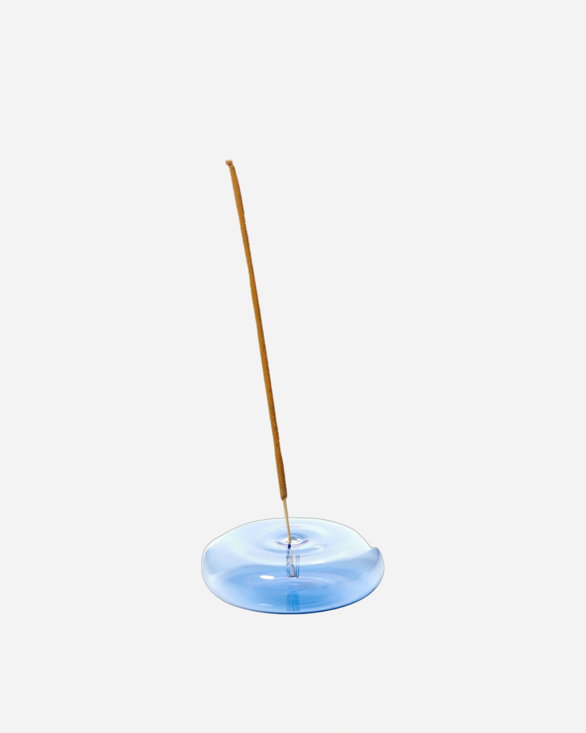 A photo of Dimple glass incense holder in blue