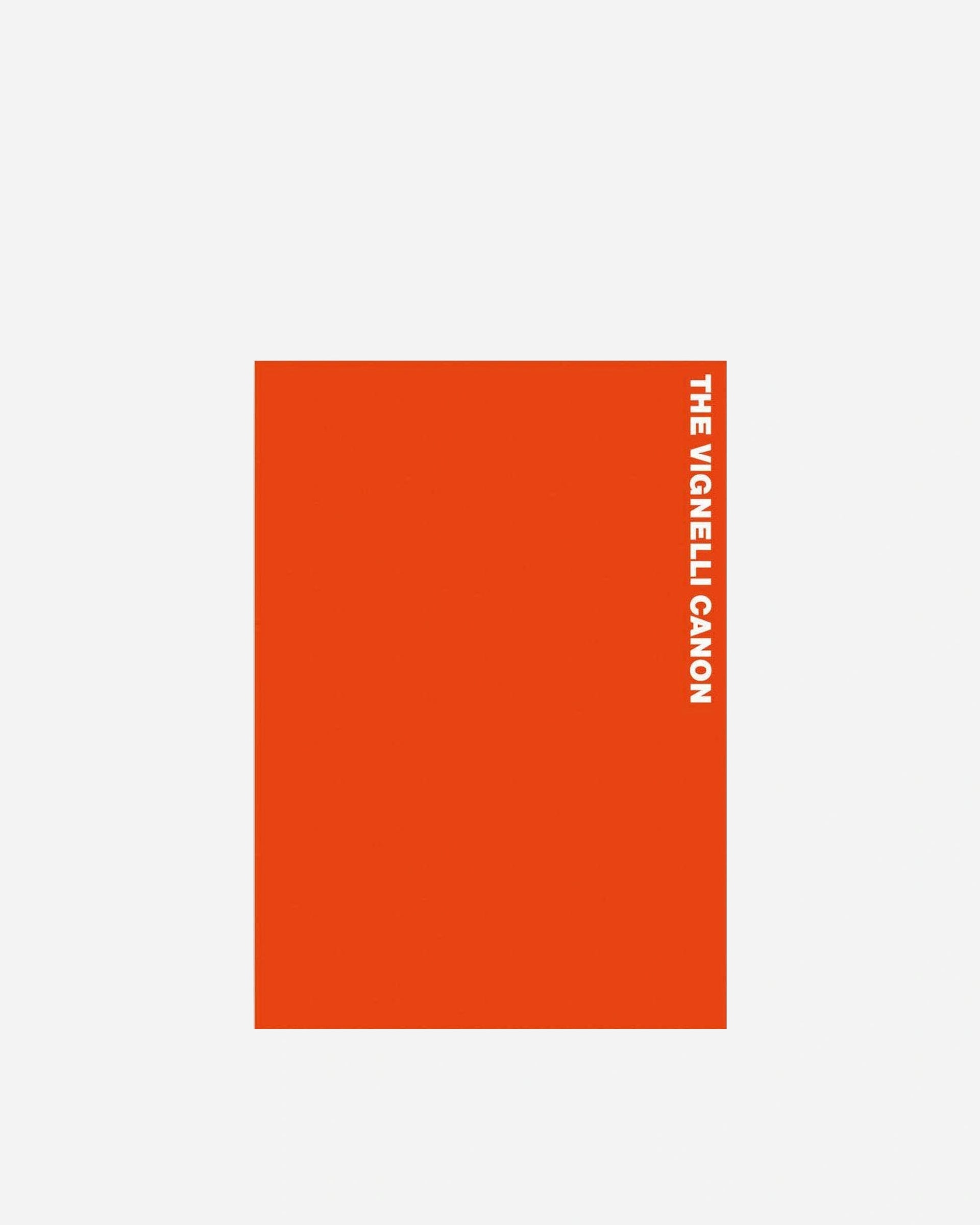 A minimalist orange-red book or album cover with the title 'THE VIGNELLI CANON' printed vertically in white along the right edge, shown against a light gray background.