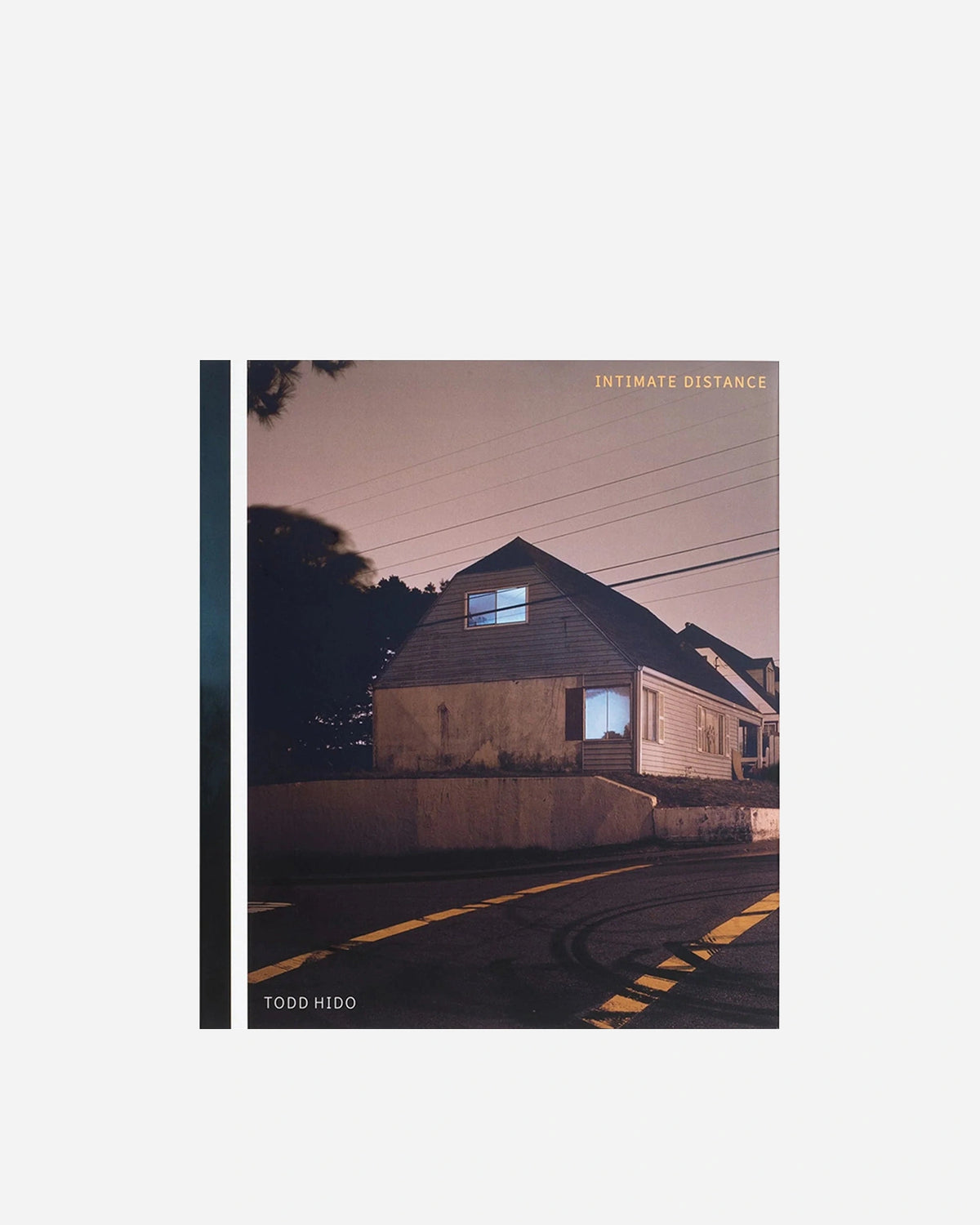 Book cover of 'Intimate Distance' by Todd Hido with a house and street scene.
