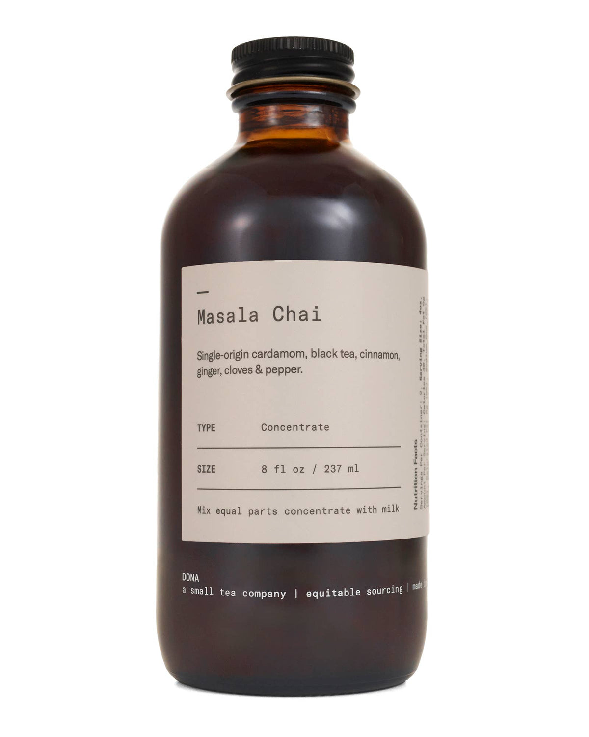 DONA Mini Masala Chai Concentrate in an 8 fl oz glass bottle