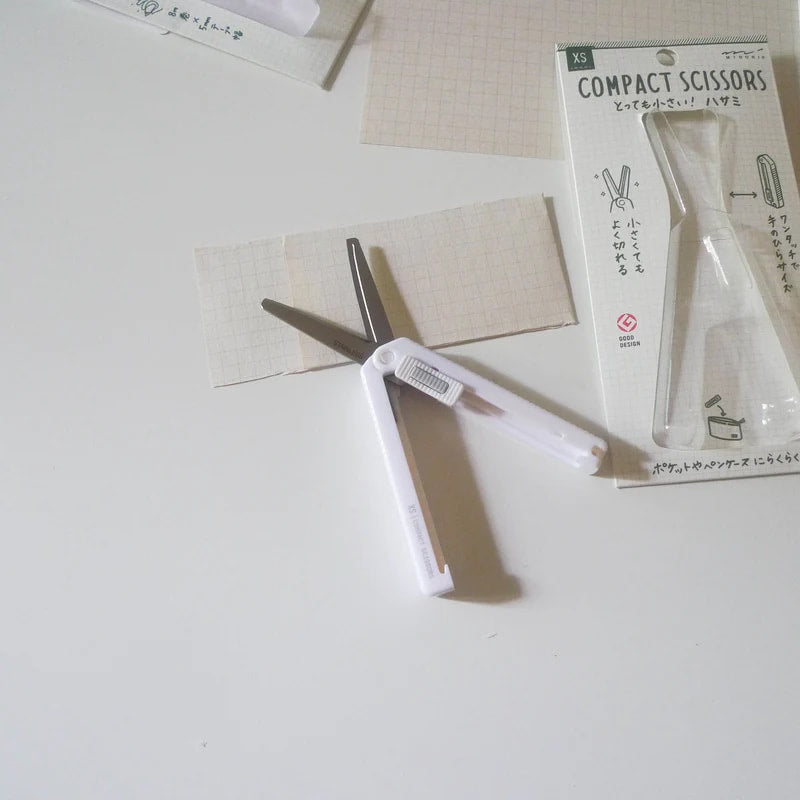 A photo of Midori XS Compact Scissors in white