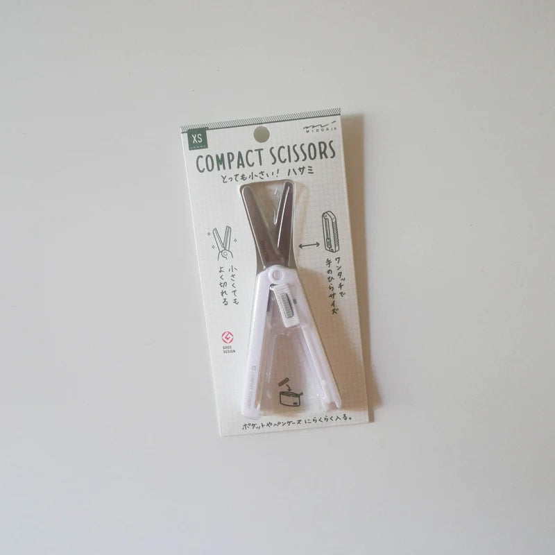 A photo of Midori XS Compact Scissors in white