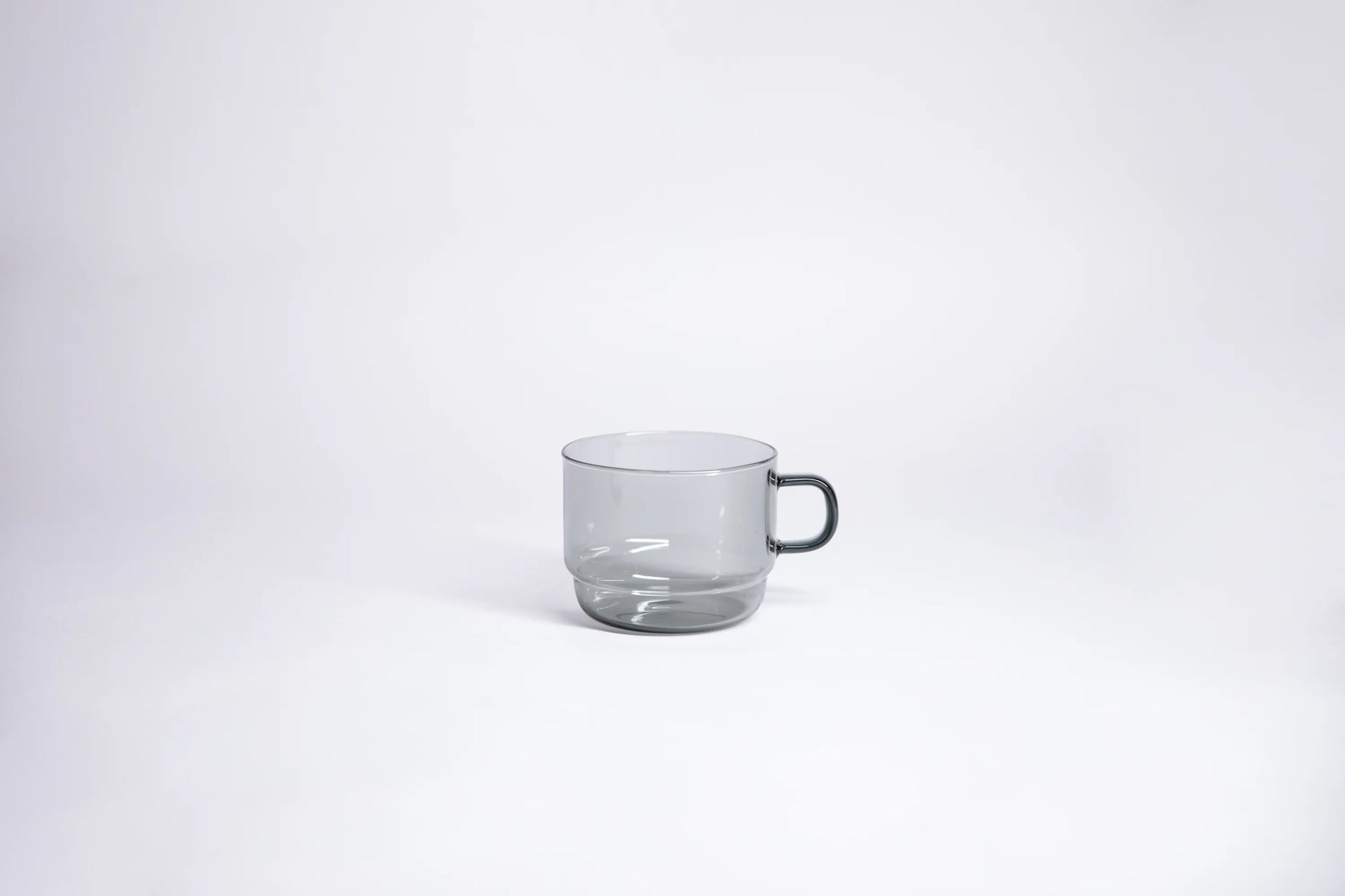 A photo of Glass stackable mug in grey