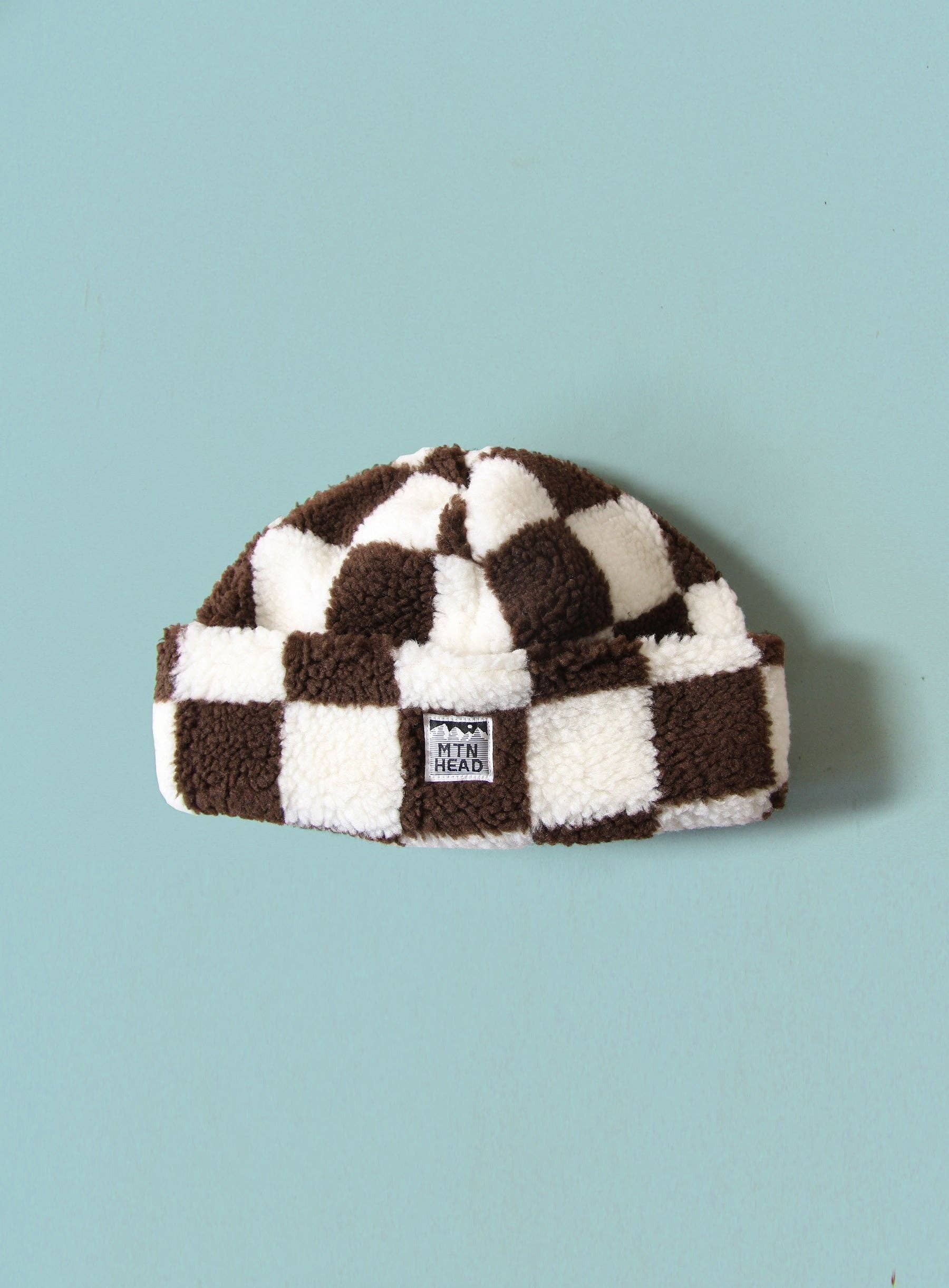 A photo of Brown Checker Toque