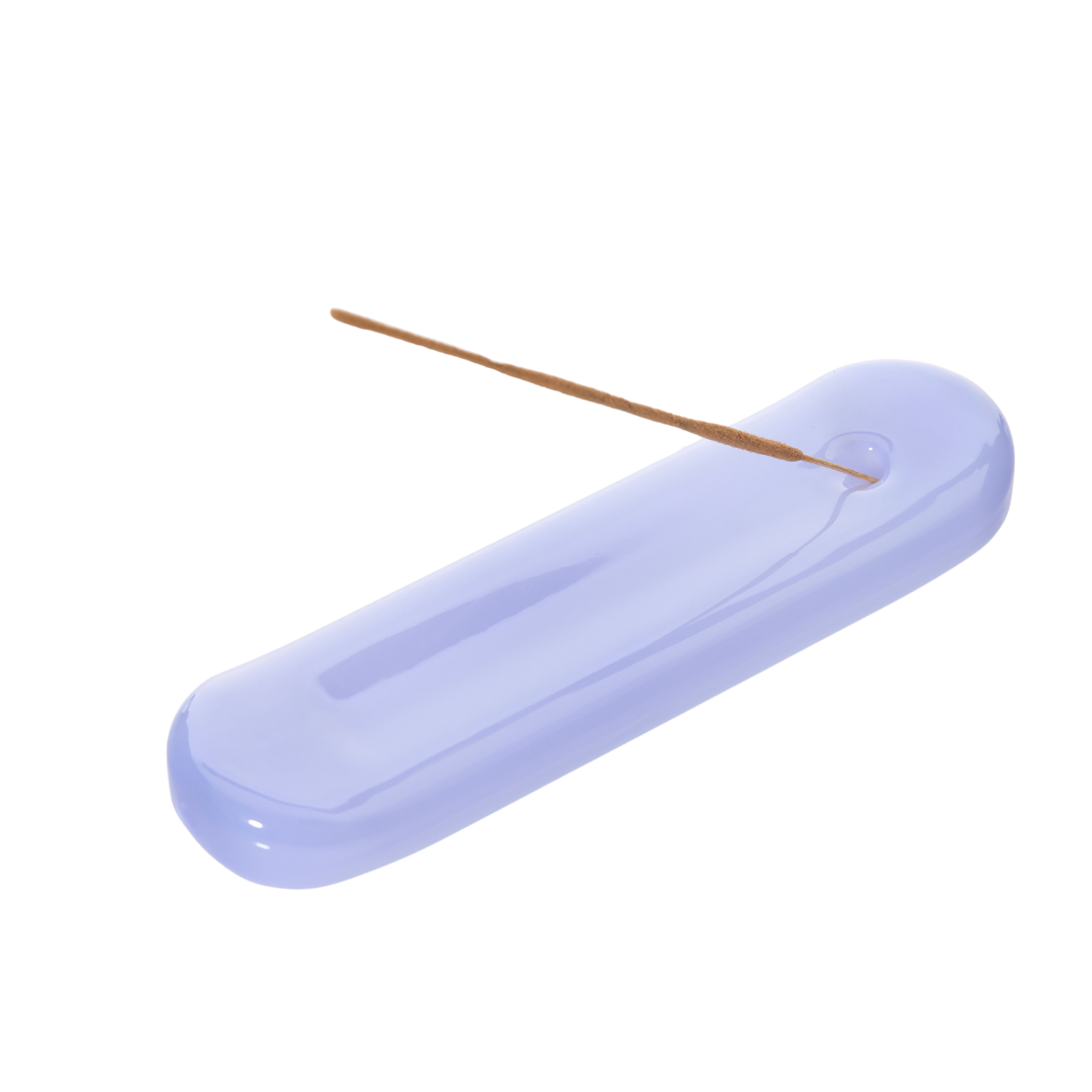 A photo of Lilo glass incense holder in milky blue