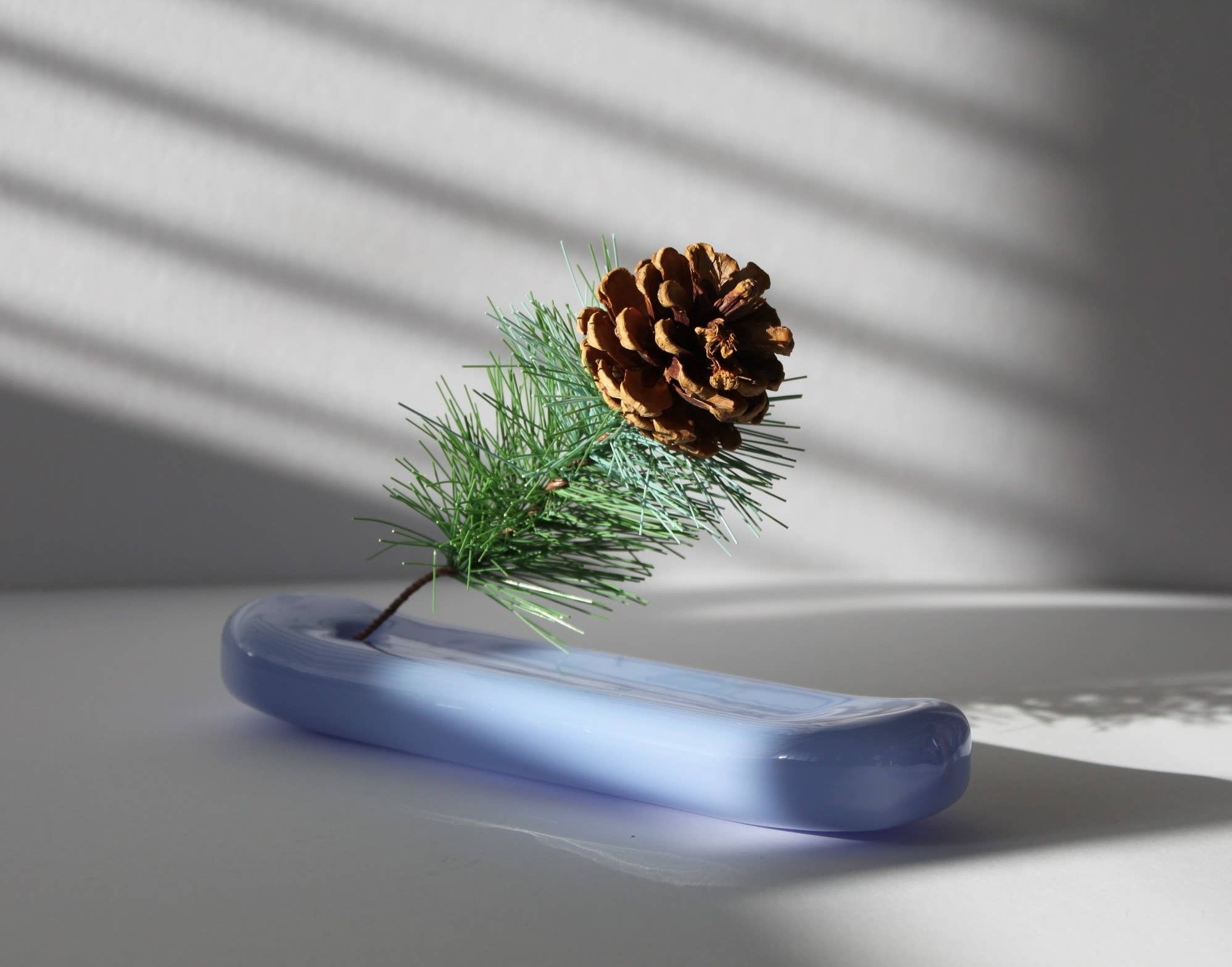A photo of Lilo glass incense holder in milky blue