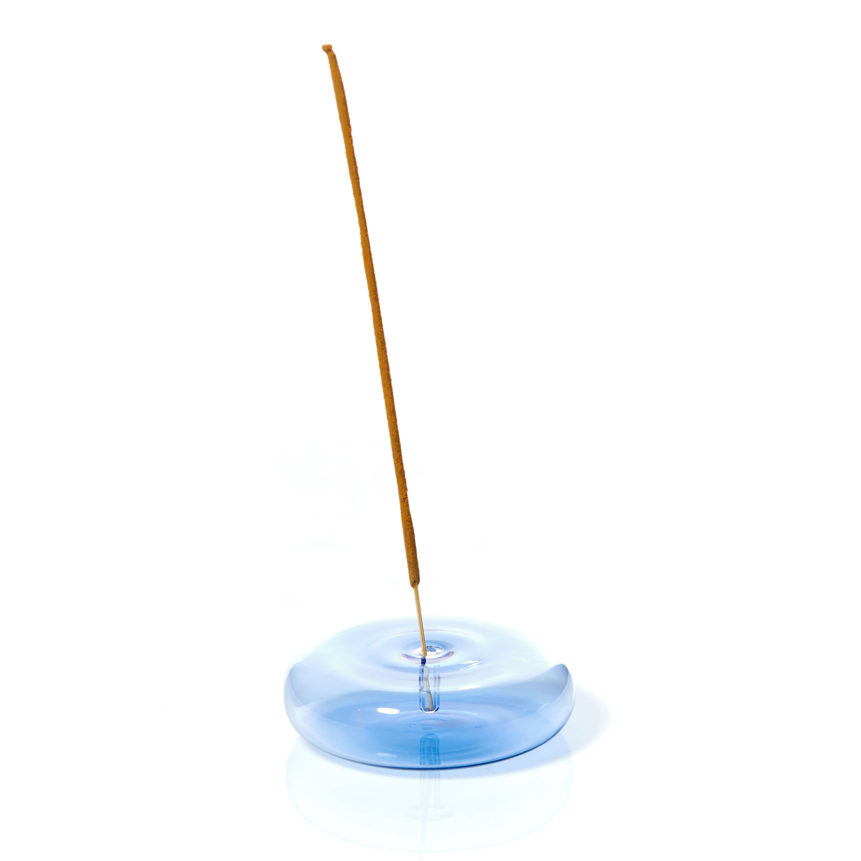 A photo of Dimple glass incense holder in blue