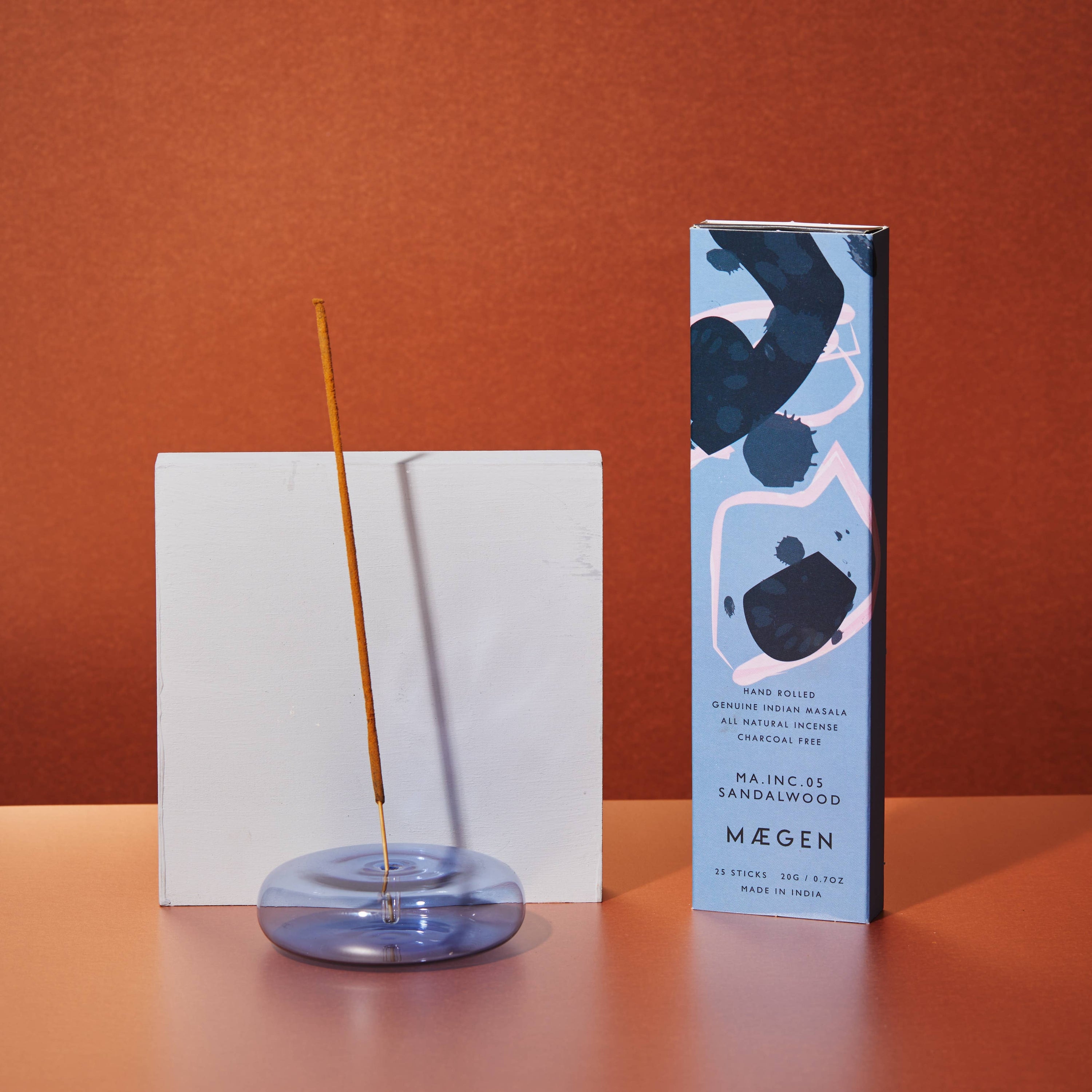 A photo of Dimple glass incense holder in blue