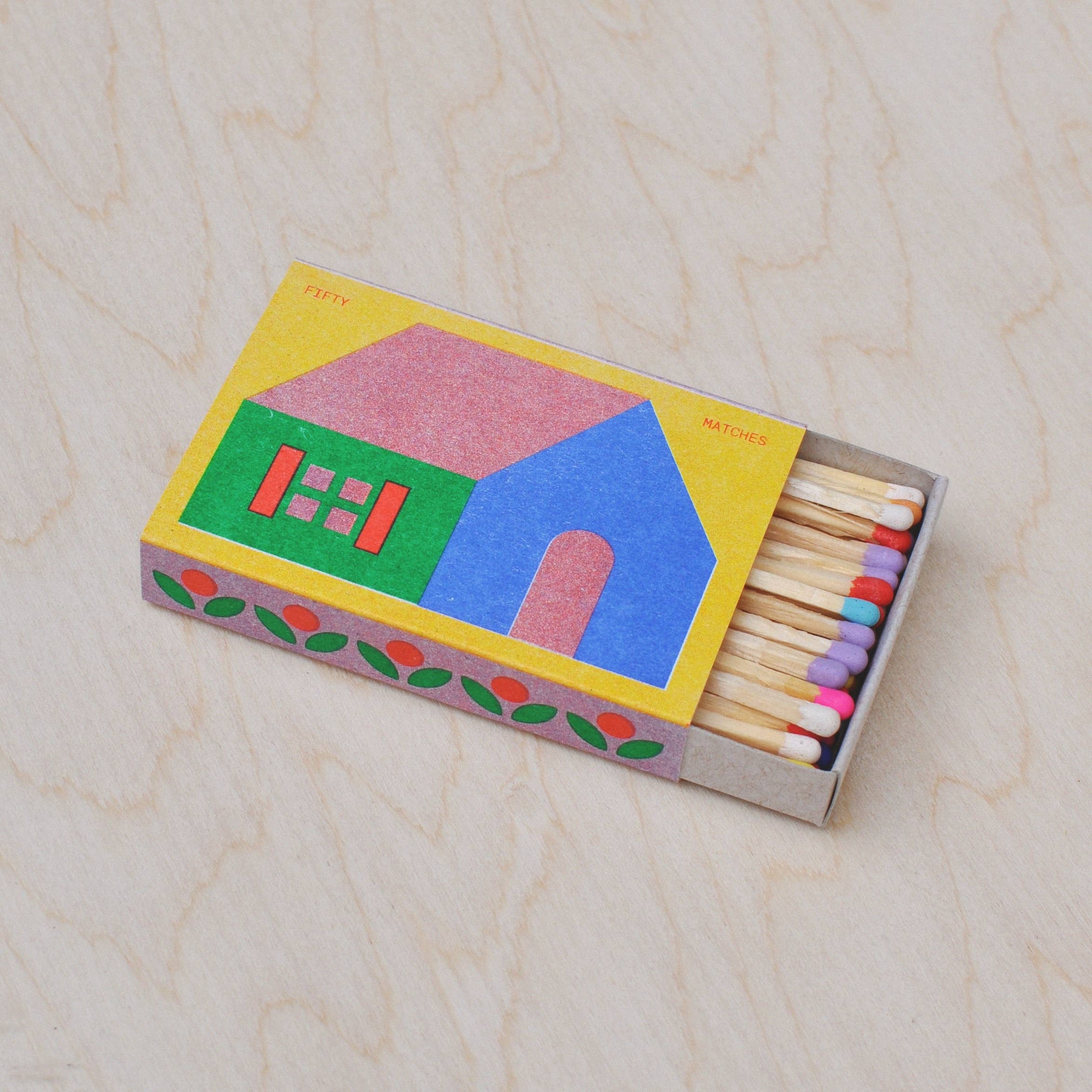 A photo of House risograph printed matchbox